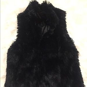 Black faux fur vest